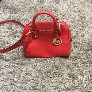 Small tangerine Michael Kors crossbody bag